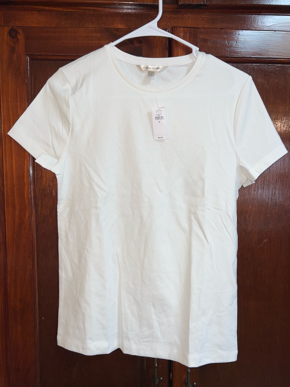 Women’s size medium, Banana Republic brand white T-shirt